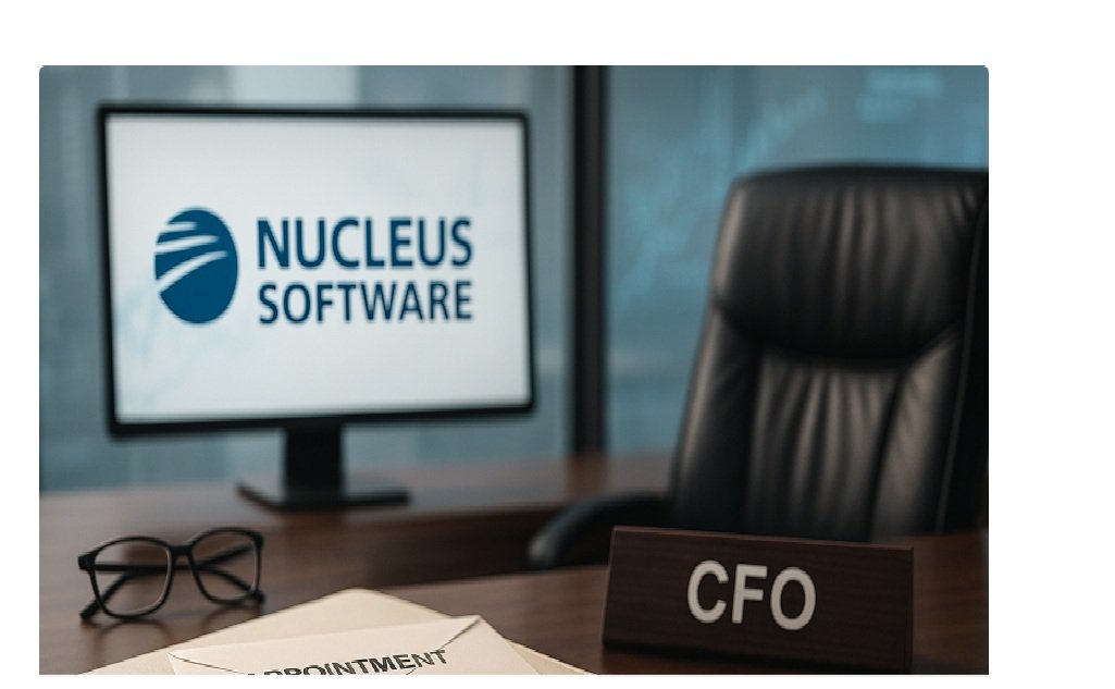 Desk with “appointment” envelope and red wax seal, CFO nameplate, gold pen, and monitor showing Nucleus Software logo.